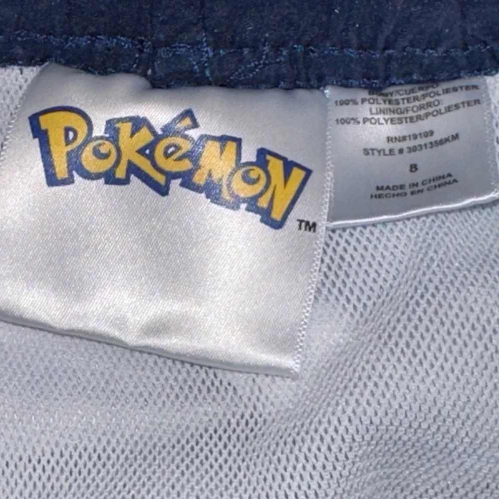3/$15 Pokémon swim trunks size 8 - Picture 2 of 4